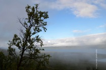Mist disappearing over lake Torneträsk